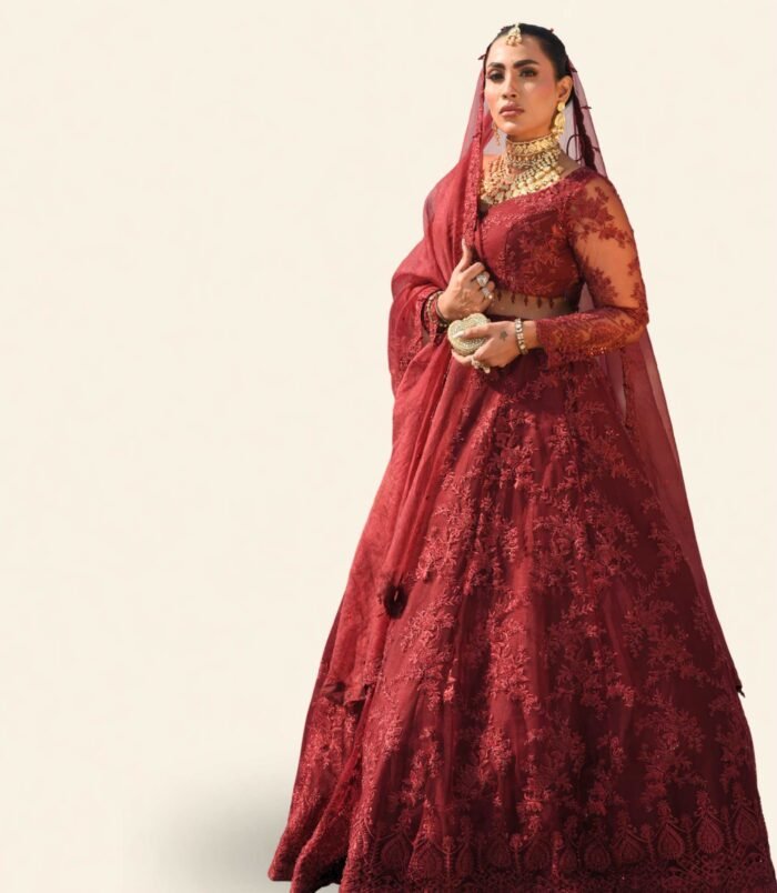 Surkh Bridal Ensemble – Dramatic Maroon Lehenga and Embellished Net Choli with Sheer Dupatta