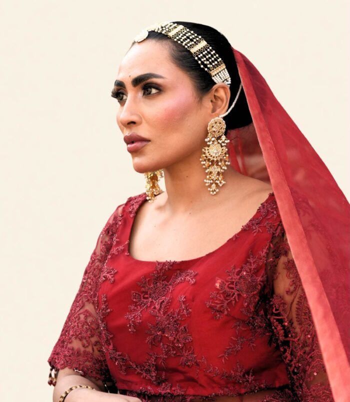Surkh Embroidered Net Choli and Maroon Lehenga – Regal Bridal Ensemble with Dramatic Dupatta